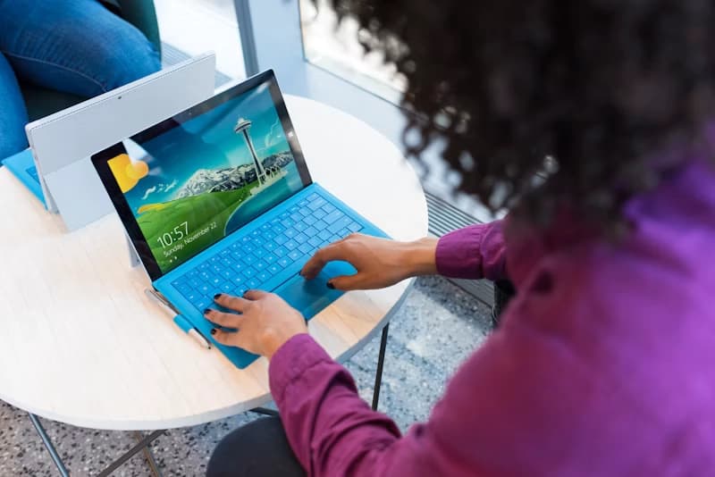 An accessibility tester performing a manual accessibility audit on a laptop to ensure WCAG compliance.